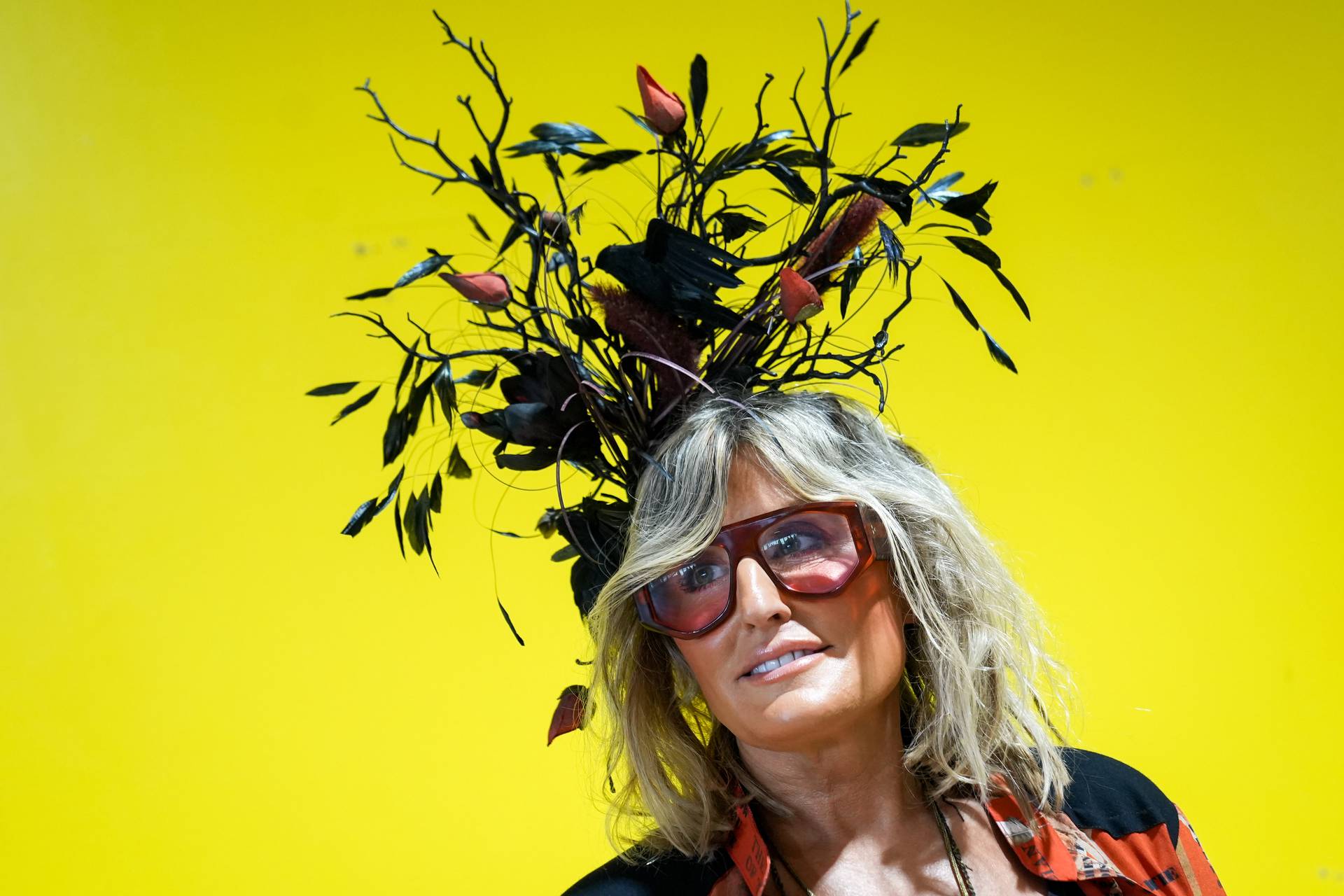 Photos: Hats, suits and rain boots round out the fashion at Preakness 2024