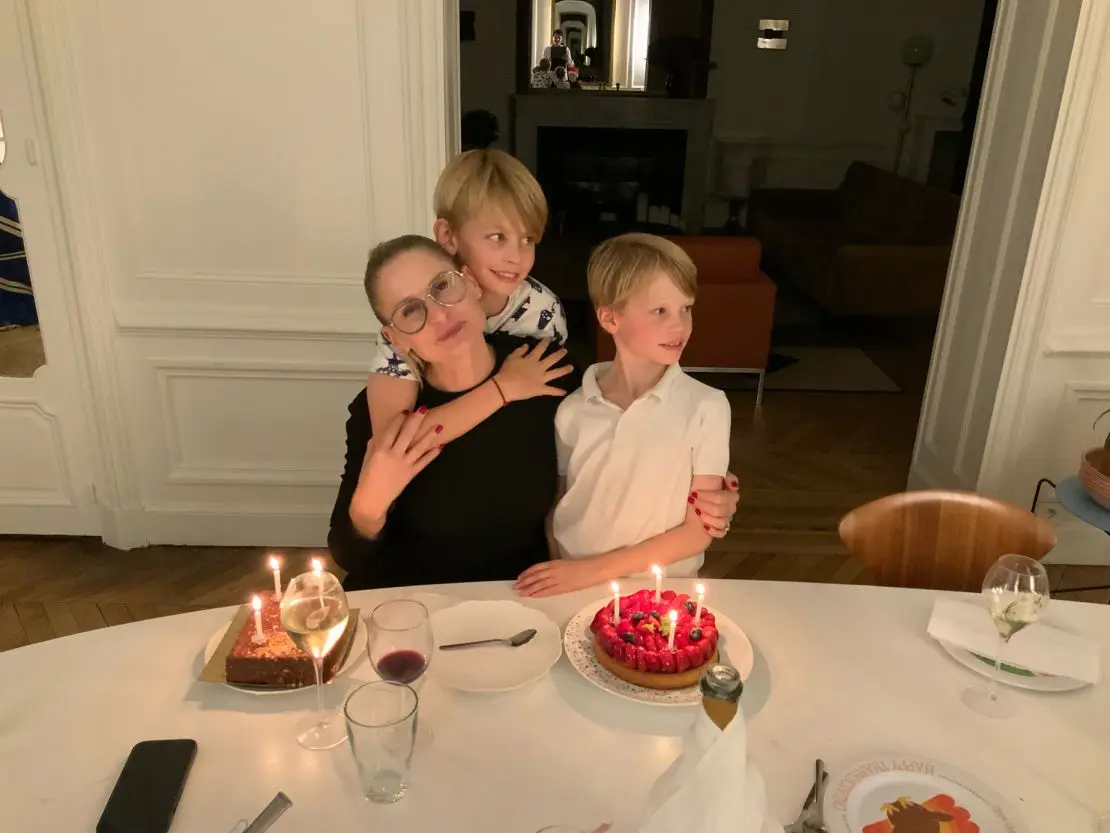 Regan with her sons at their apartment in Paris.