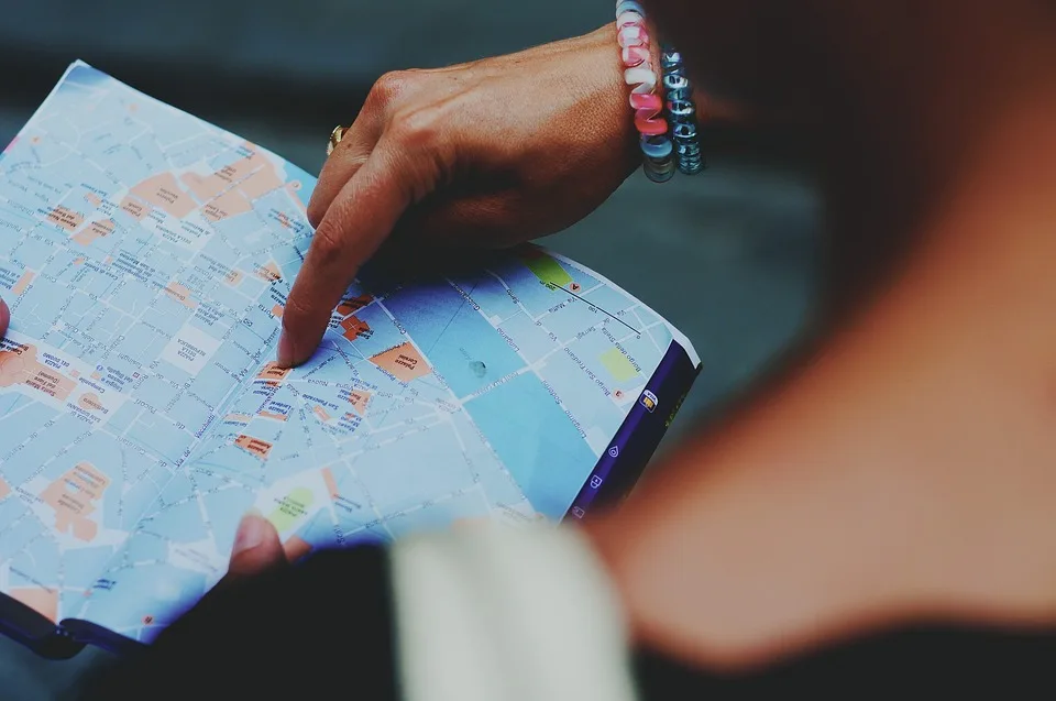 a person pointing at a map