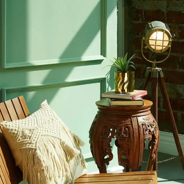 green living area with boho accents