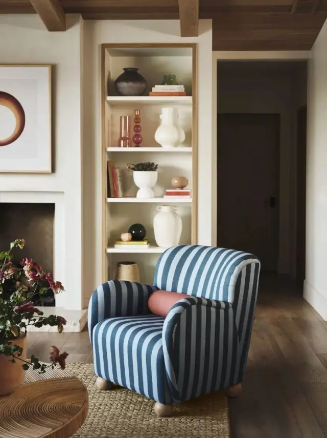 living room with modern blue striped armchair