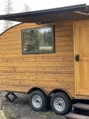 2022 custom Timberline towable from Homegrown Trailers is a tiny house and travel trailer hybrid with off-grid capabilities