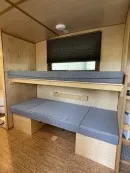 2022 custom Timberline towable from Homegrown Trailers is a tiny house and travel trailer hybrid with off-grid capabilities