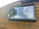 2022 custom Timberline towable from Homegrown Trailers is a tiny house and travel trailer hybrid with off-grid capabilities