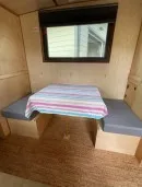 2022 custom Timberline towable from Homegrown Trailers is a tiny house and travel trailer hybrid with off-grid capabilities
