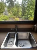 2022 custom Timberline towable from Homegrown Trailers is a tiny house and travel trailer hybrid with off-grid capabilities