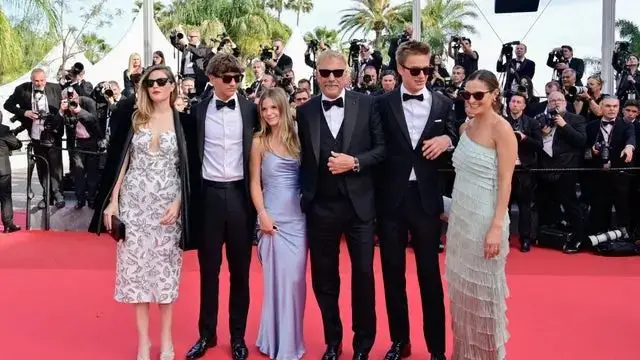 Kevin with his five children Annie, 40, and Lily, 37, from his first marriage to Cindy Silva, alongside Cayden, 17, Grace, 13, and Hayes, 15