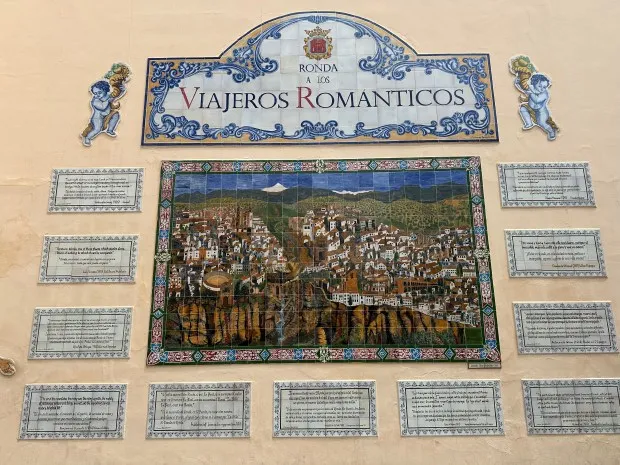 Colorful wall tiles tell the story of people who've traveled to Ronda, Spain. (Donna Vickroy/Naperville Sun)
