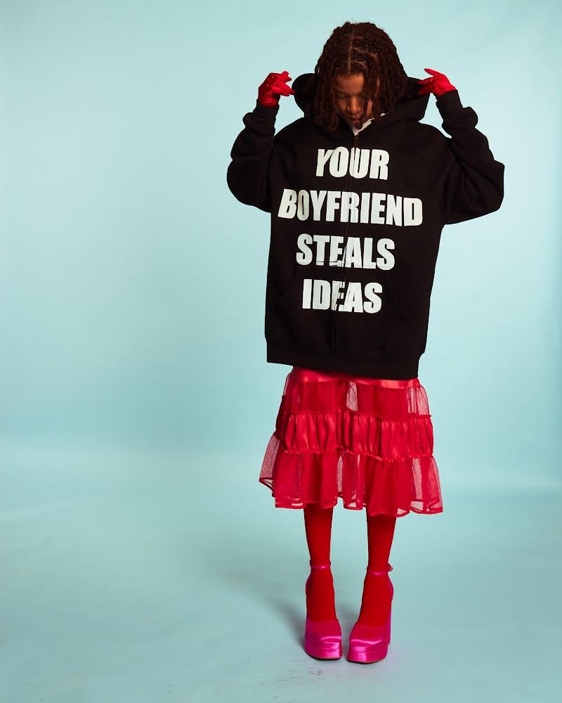 Meet Drelli: The Daringly Original Musician Ventures Into Fashion with ‘Your BF Steals Ideas’