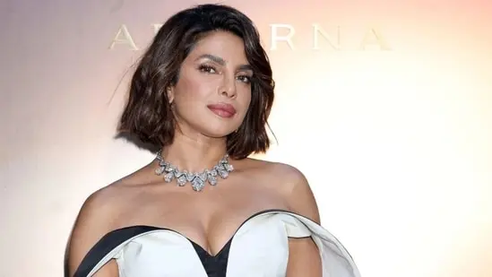 Priyanka Chopra posed for the paparazzi stationed at the event.