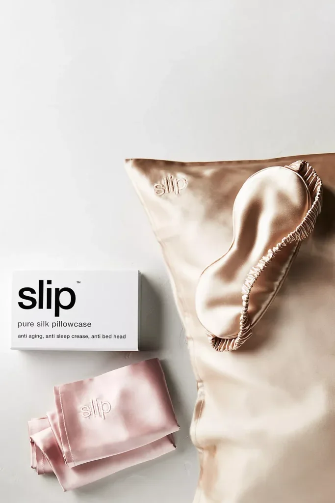 We swear by Slip silk pillowcases to prevent frizz while we're sleeping, & we've heard that it helps with wrinkles too. 