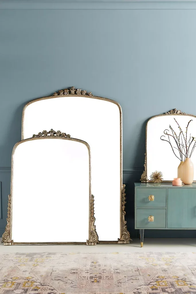 This insanely gorg gold Anthropologie mirror has a nice, vintage vibe, but it also comes in silver & black!