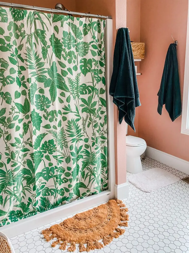 Like...cute shower curtains (think: Anthro, Target, Urban Outfitters). Dare to be adventurous & grab a fun printed 1 instead of plain white!