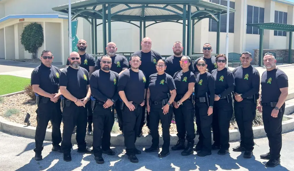 Group photo of parole staff wearing mental health shirts.