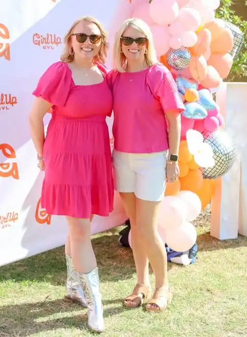 Laura Winston, Holly Jones at the 3rd Annual GirlUpGreenville and Marleylilly fashion show. The event at Marleylilly’s headquarters, celebrated and benefitted GirlUpGreenville’s work to help Greenville girls reach their full potential and know their true worth and value. Marleylilly specializes in monogrammed clothing, accessories and gifts.