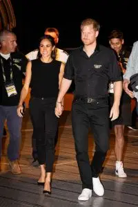 DUSSELDORF, GERMANY - SEPTEMBER 13: Meghan, Duchess of Sussex and Prince Harry, Duke of Sussex at the wheelchair basketball final between the United States and France during day four of the Invictus Games on September 13, 2023 in Dusseldorf, Germany. (Photo by Patrick van Katwijk/Getty Images)
