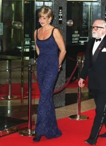 LONDON, UNITED KINGDOM - FEBRUARY 12:  Diana, Princess Of Wales Attending The Premiere Of The Film 'in Love And War' At The Empire In Leicester Square In Aid Of The British Red Cross Anti-personnel Mines Campaign. With Her Is Actor Richard (dickie) Attenborough, The Film's Director.  The Princess Is Wearing A Tight-fitting Blue Lace Dress Designed By Catherine Walker.  (Photo by Tim Graham Photo Library via Getty Images)