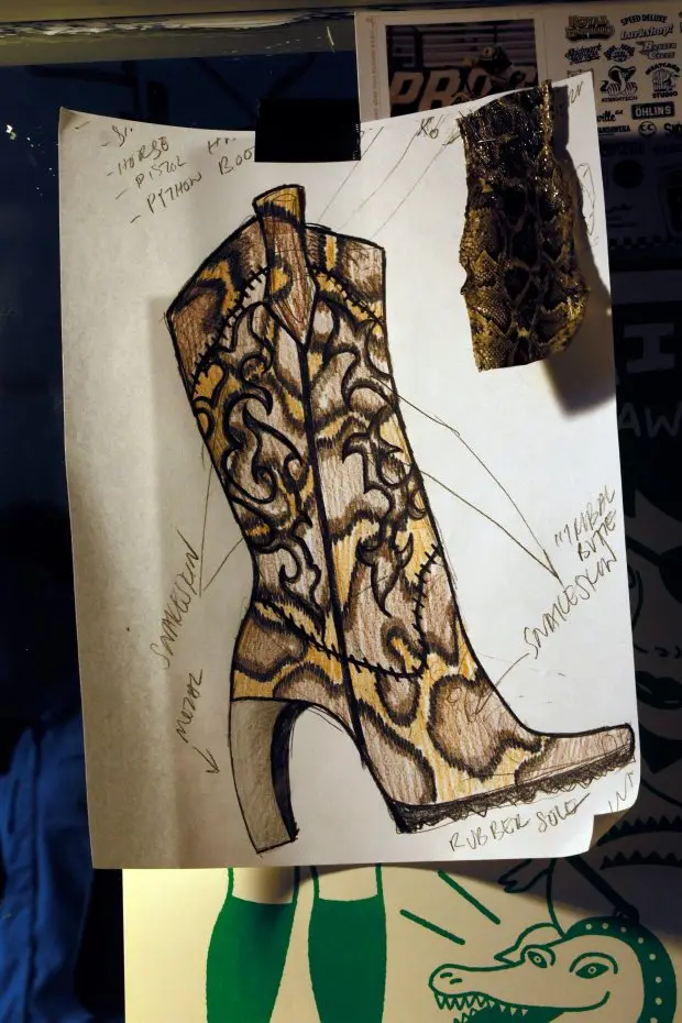 A drawing for a Python boot by Designer Elle Barbeito is seen Thursday, May 16, 2024, in her Miami studio, She uses the skins in her latest collection,. Florida Girl, which is inspired by women she knows. (Joe Cavaretta/South Florida Sun Sentinel)