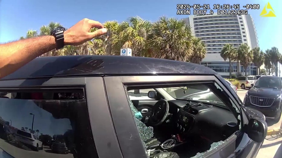 Video: Clearwater police smash window to rescue distressed dog from hot car while owner ‘was at the beach’
