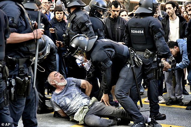 Protesters clash with police after Barcelona park was closed