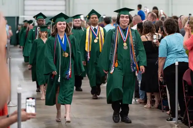 York County School of Technology seniors enter their commencement ceremony at UPMC Arena on Thursday, May 23, 2024.