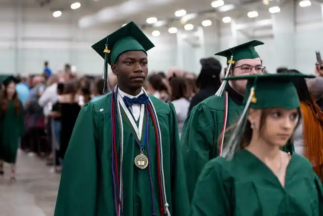 York County School of Technology seniors enter their commencement ceremony at UPMC Arena on Thursday, May 23, 2024.