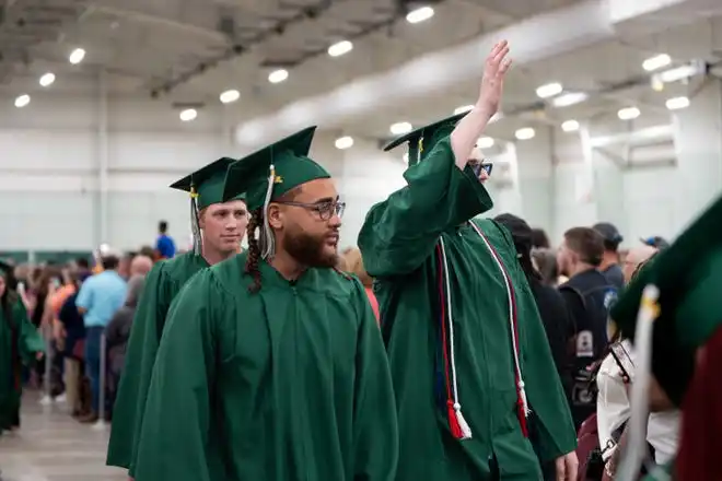 York County School of Technology seniors enter their commencement ceremony at UPMC Arena on Thursday, May 23, 2024.