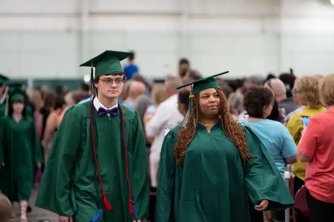 York County School of Technology seniors enter their commencement ceremony at UPMC Arena on Thursday, May 23, 2024.