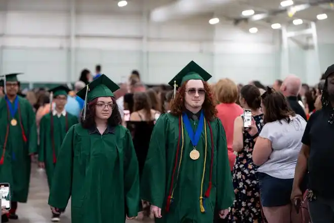York County School of Technology seniors enter their commencement ceremony at UPMC Arena on Thursday, May 23, 2024.