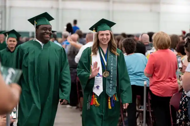 York County School of Technology seniors enter their commencement ceremony at UPMC Arena on Thursday, May 23, 2024.