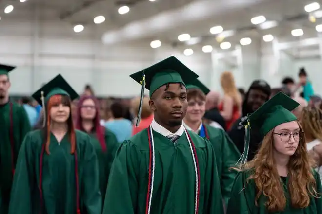 York County School of Technology seniors enter their commencement ceremony at UPMC Arena on Thursday, May 23, 2024.