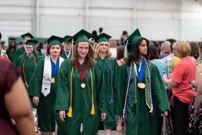 York County School of Technology seniors enter their commencement ceremony at UPMC Arena on Thursday, May 23, 2024.
