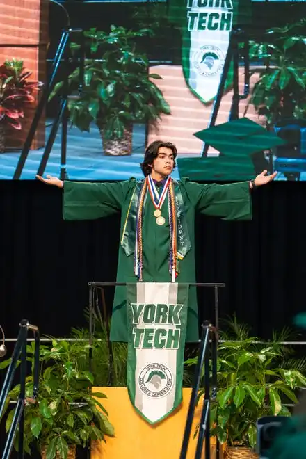 York County School of Technology’s senior class President and Valedictorian, Jonathan Hernández, delivers a powerful speech about family, life, and happiness to his class during the commencement ceremony at UPMC Arena on Thursday, May 23, 2024.