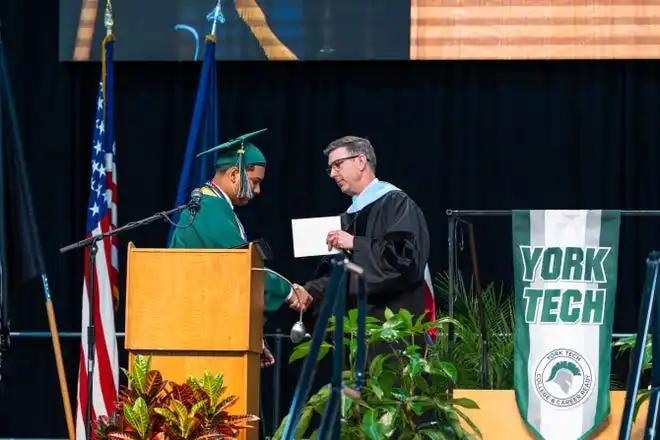 York County School of Technology’s Salutatorian, Ismael Peralta Anziani, delivers a speech in both Spanish and English to their class during the commencement ceremony at UPMC Arena on Thursday, May 23, 2024.