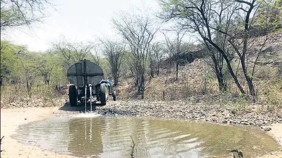 A natural pond being refilled in Khod. (Parveen Kumar/HT Photo)