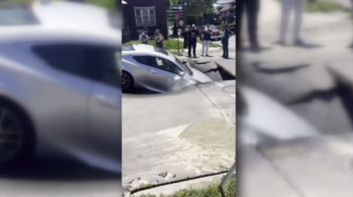 Water main leak causes sinkhole to engulf woman’s car in SW Detroit