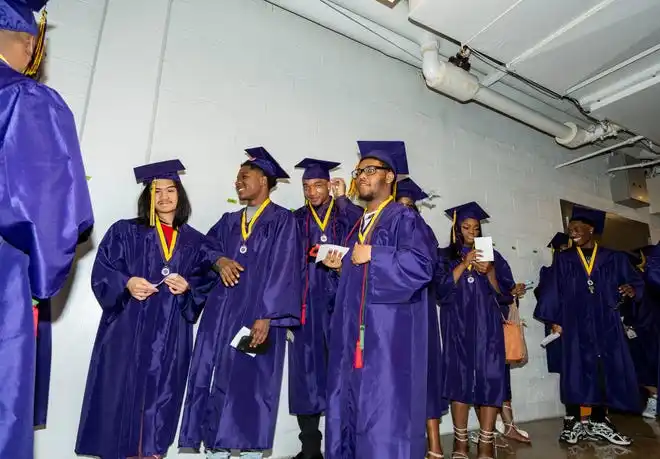Washington High School of Information Technology class of 2024 students prepare for the graduation ceremony on Thursday May 23, 2024 at the UWM Panther Arena in Milwaukee, Wis.