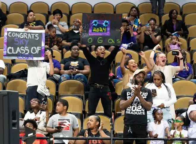 Families cheer for the Washington High School of Information Technology class of 2024 during the graduation ceremony on Thursday May 23, 2024 at the UWM Panther Arena in Milwaukee, Wis.