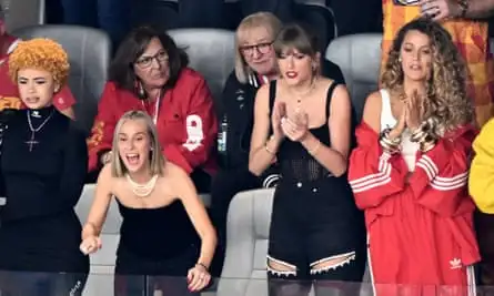 Taylor Swift (second from right) wears a corset by Dion Lio at the Super Bowl in Las Vegas in February.