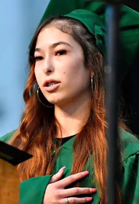 The Pledge of Allegiance is led by graduate Gabriella Farber during the York County School of Technology Graduation Ceremony at York Expo Center in West Manchester Township, Thursday, May 23, 2024. (Dawn J. Sagert/The York Dispatch)