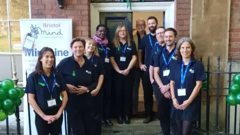 Bristol Mind  Bristol Mind team stand outside their offices 