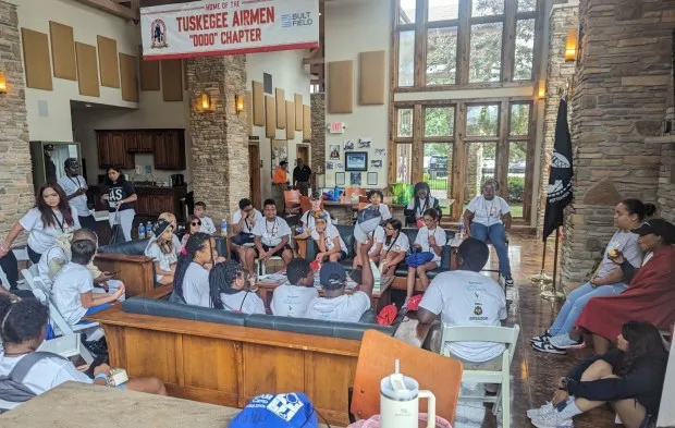 Students gather at Bult Field Airport in Monee as part of a STEAM camp offered by Governors State University in 2023. This year's session is in July, and one day will be devoted to aviation. (Governors State University)