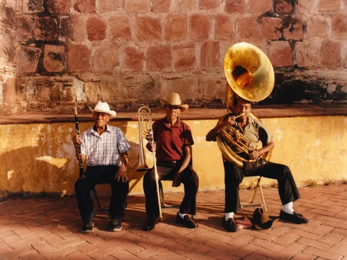 Musicians Eugenio Martínez Pérez, 79, Gerardo Martínez Pérez, 72, and Florencio García López, 86. Eugenio wears Giorgio Armani leather loafers, £1,100. Gerardo wears Prada brushed leather loafers, £850