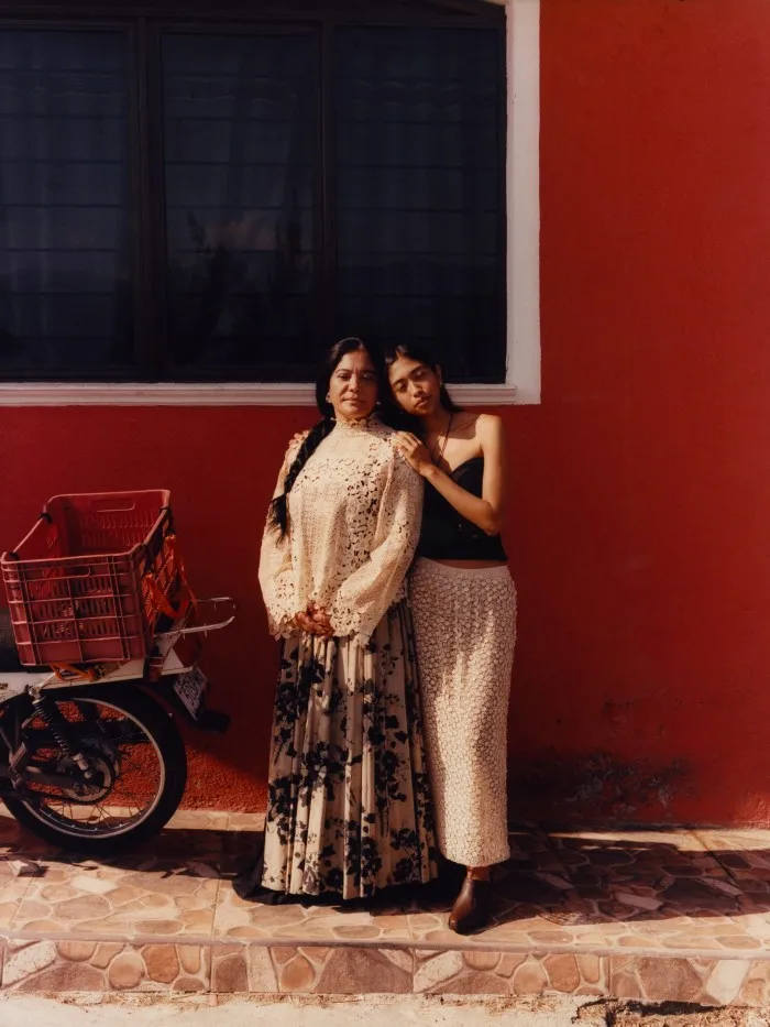 Producer Luisa Elizabeth Camaño Pacheco, 36, and model Zentyatze Elizabeth Echeverria Camaño, 23. Luisa (left) wears Dior cotton/lace top, £8,200, and cotton gabardine skirt, £4,400. Annika Inez sterling-silver earrings, £305.75. Zentyatze wears Chloé linen/cashmere/silk broderie anglaise knit top, £1,279. Dior embroidered cotton guipure-lace skirt, £3,800, metal and resin earrings, £440. Pamela Love gold-plated-brass and resin necklace, £150. Annika Inez glass and onyx pendant necklace, £183. Tecovas leather Brooke shoes, $195