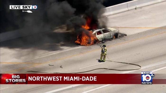Firefighters work on Turnpike car fire in Miramar