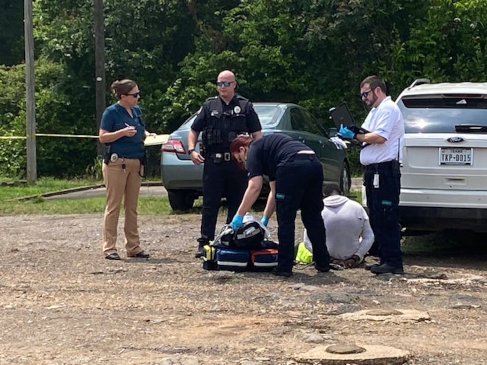 Man hospitalized after getting hit by car and stabbed