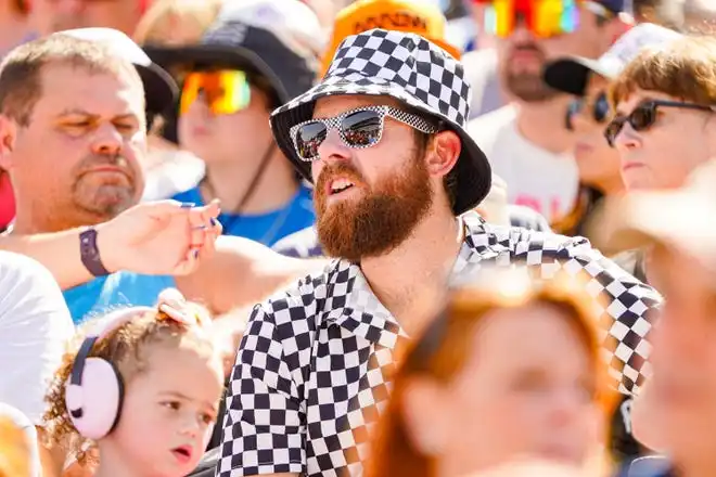 Fans dress to impress on Thursday, May 23, 2024, during Carb Day ahead of the 108th running of the Indianapolis 500 at Indianapolis Motor Speedway.