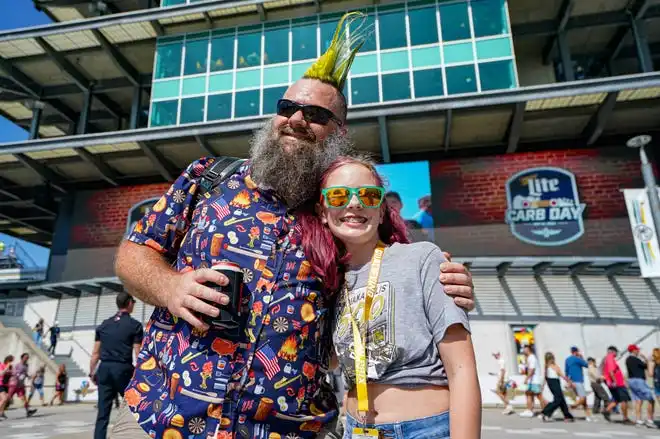 Fans dress to impress on Thursday, May 23, 2024, during Carb Day ahead of the 108th running of the Indianapolis 500 at Indianapolis Motor Speedway.