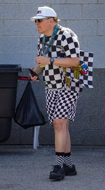 Fans dress to impress on Thursday, May 23, 2024, during Carb Day ahead of the 108th running of the Indianapolis 500 at Indianapolis Motor Speedway.