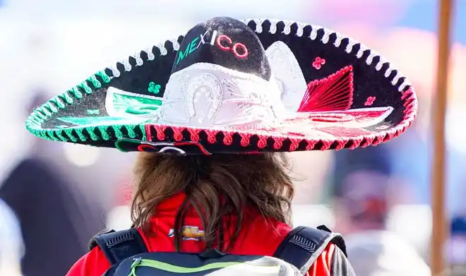 Fans dress to impress on Thursday, May 23, 2024, during Carb Day ahead of the 108th running of the Indianapolis 500 at Indianapolis Motor Speedway.